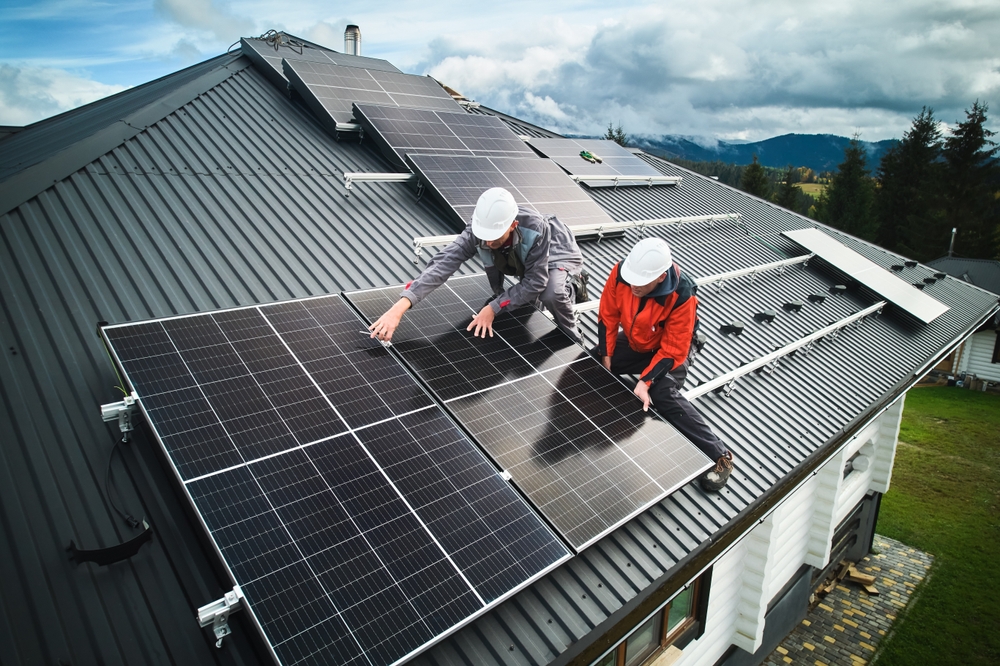 Professional,Technicians,Securing,Heavy,Solar,Photovoltaic,Panels.,Male,Workers,Installing
