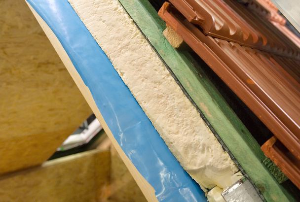 stock-photo-thermal-insulation-of-a-house-roof
